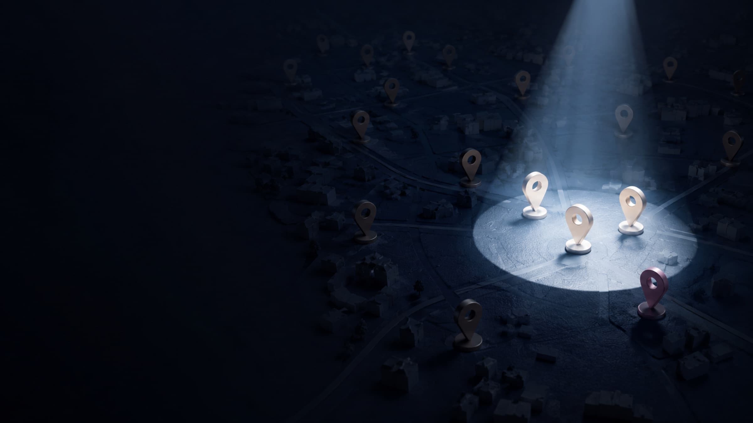 A dark neighbourhood map covered in location pins, with a spotlight illuminating a small cluster, representing the local providers that get found in the new search era.